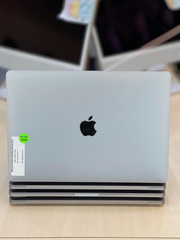 Rear view of Apple MacBook Pro 2022 showing Apple logo and durable hinge