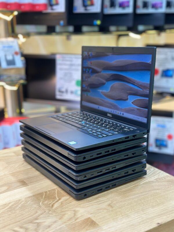 Left side view of Dell Latitude 7490 with visible ports and ventilation
