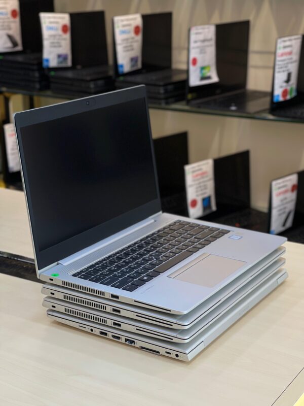 Right side profile of HP EliteBook 840 G6 showing ports and slim aluminum body.